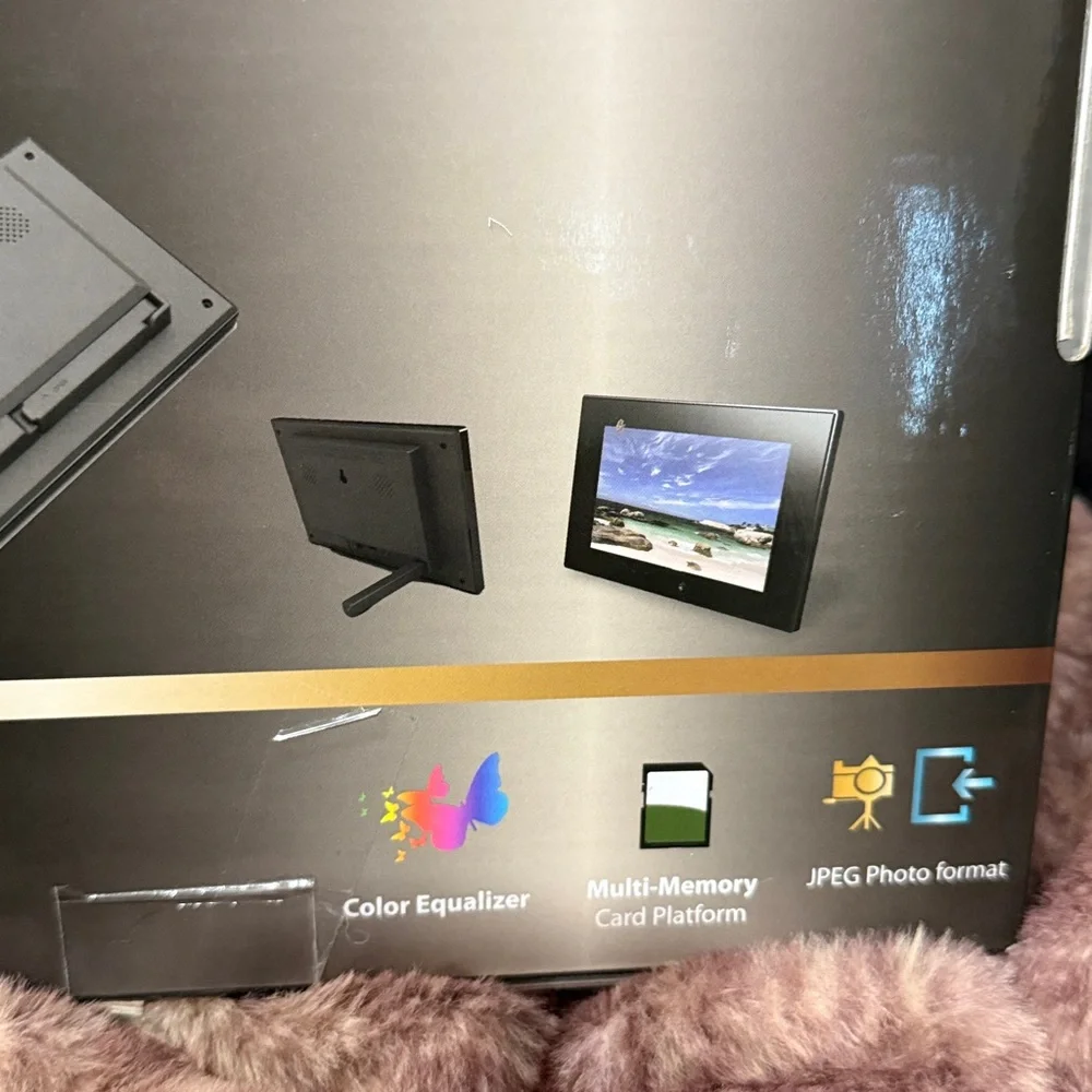 New digital 7” full function black acrylic photo frame with stand -Easy to use.